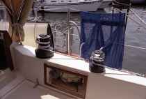 [On deck, starboard side of cockpit]