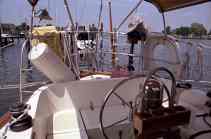 [On deck, aft end of cockpit]